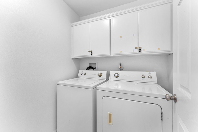 Laundry room with a washer and dryer